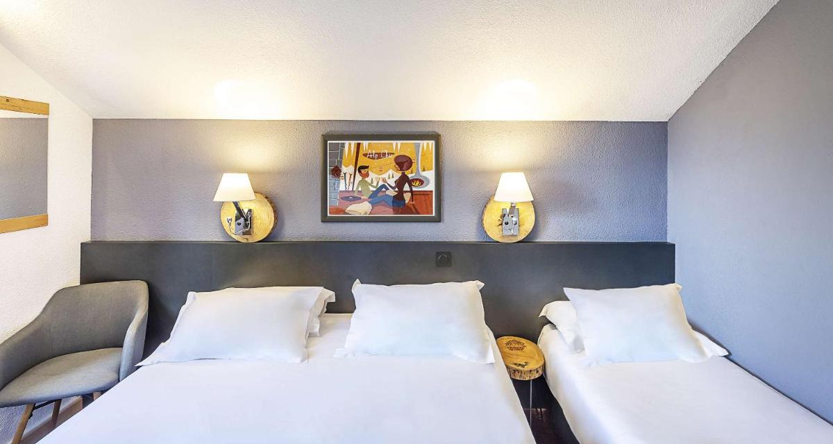 Un ou plusieurs lits dans un hébergement de l'établissement Sure Hotel by Best Western Annecy