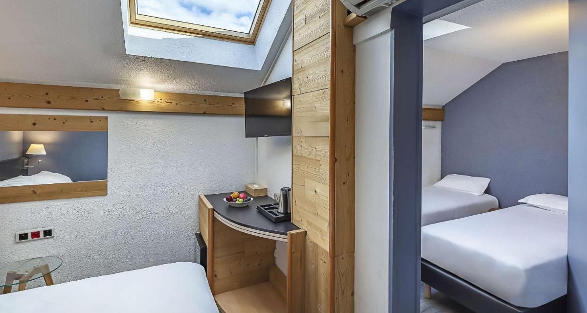 Un ou plusieurs lits dans un hébergement de l'établissement Sure Hotel by Best Western Annecy