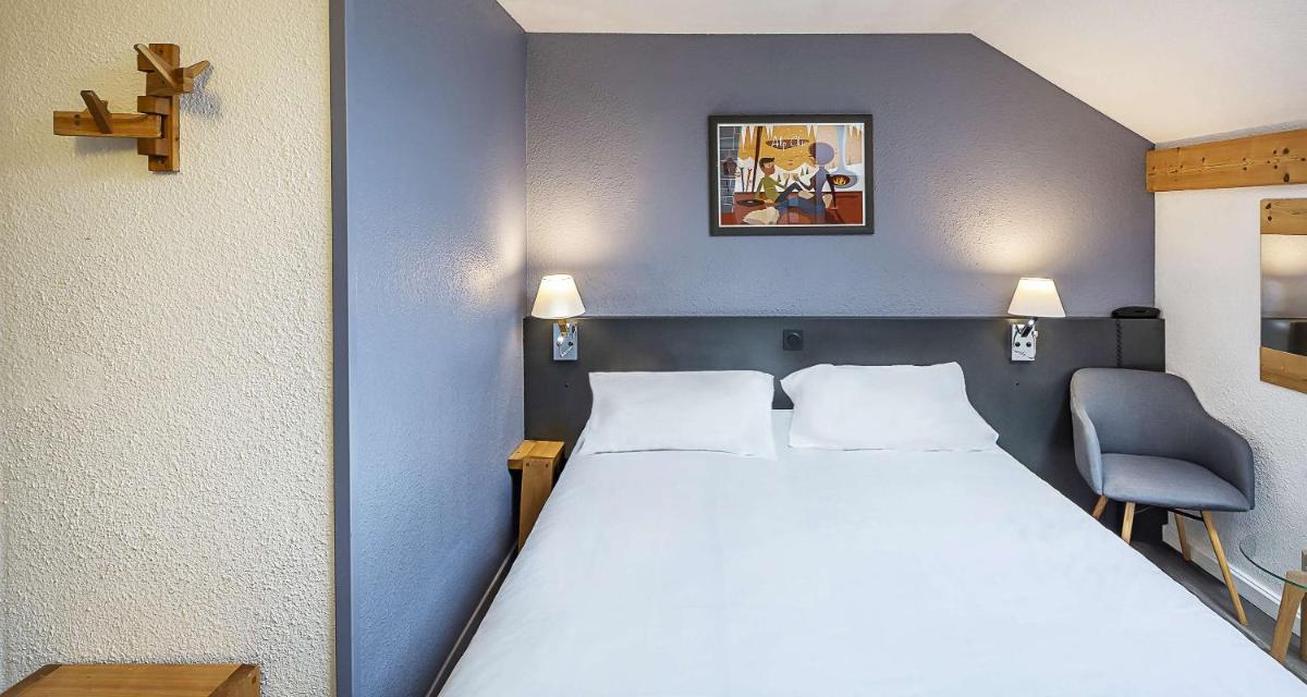 Un ou plusieurs lits dans un hébergement de l'établissement Sure Hotel by Best Western Annecy