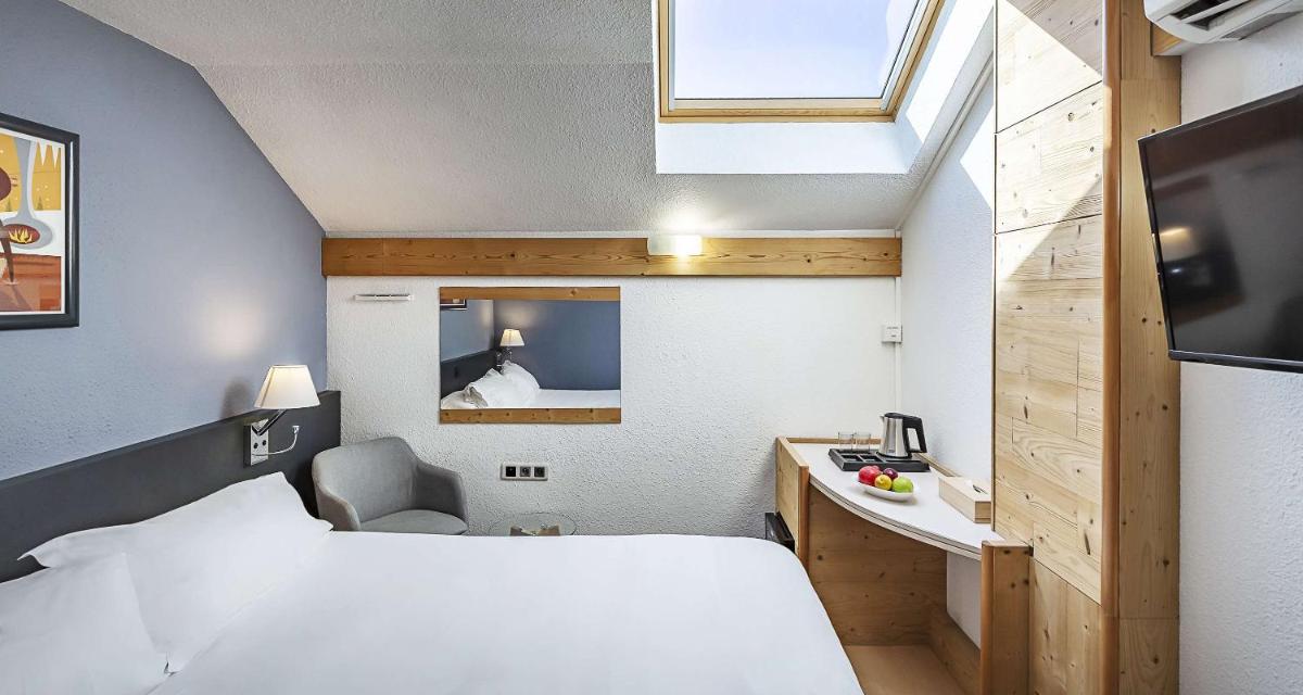 Un ou plusieurs lits dans un hébergement de l'établissement Sure Hotel by Best Western Annecy