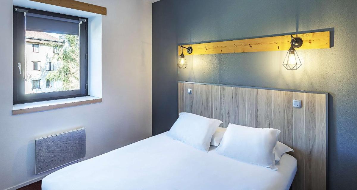 Un ou plusieurs lits dans un hébergement de l'établissement Sure Hotel by Best Western Annecy