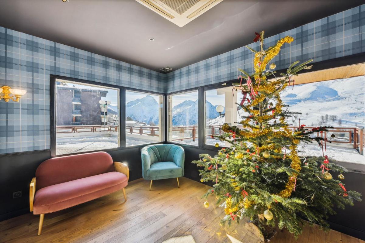 Coin salon dans l'établissement Hotel Turan & Spa