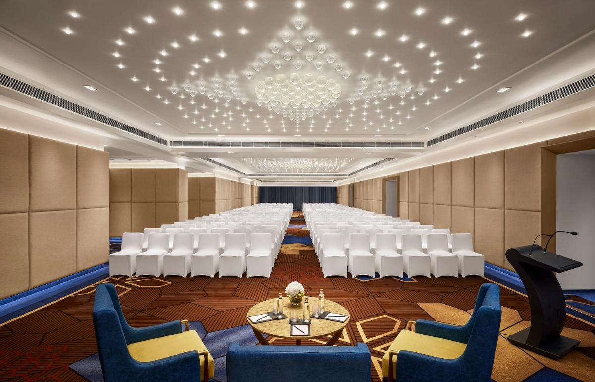 a conference room with a long table and chairs at Hyatt Centric Sector17 Chandigarh in Chandīgarh