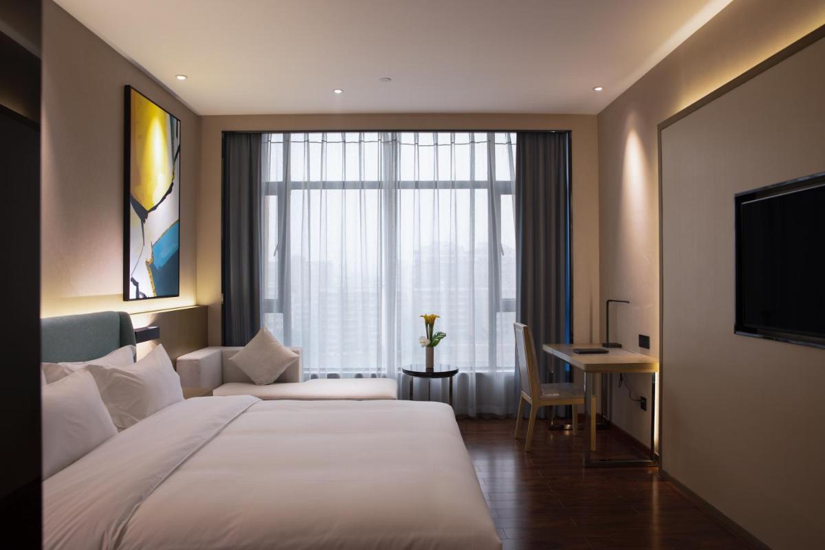 Jinmanfu International Hotel - Housity