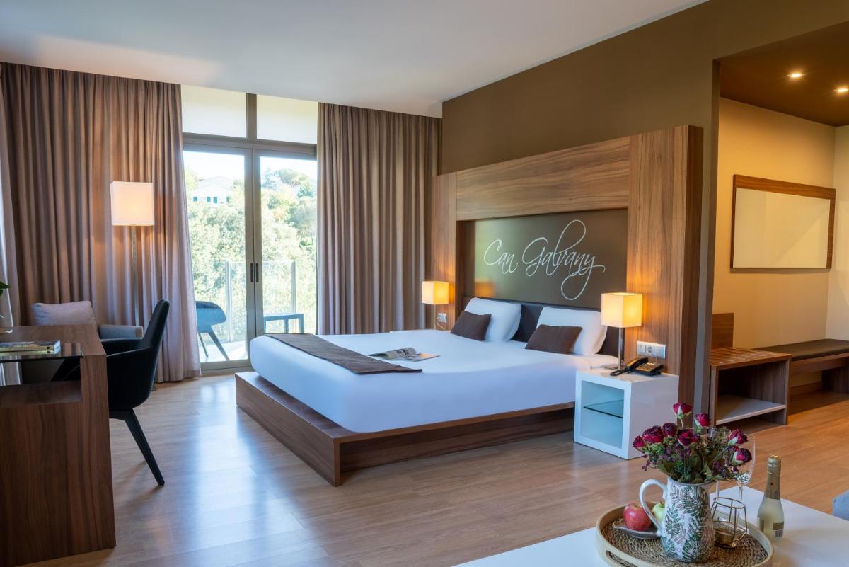 Cama o camas de una habitación en Hotel & Spa Golden Barcelona