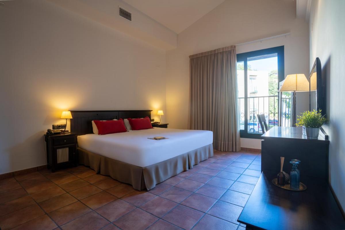Cama o camas de una habitación en Hotel & Spa Golden Barcelona