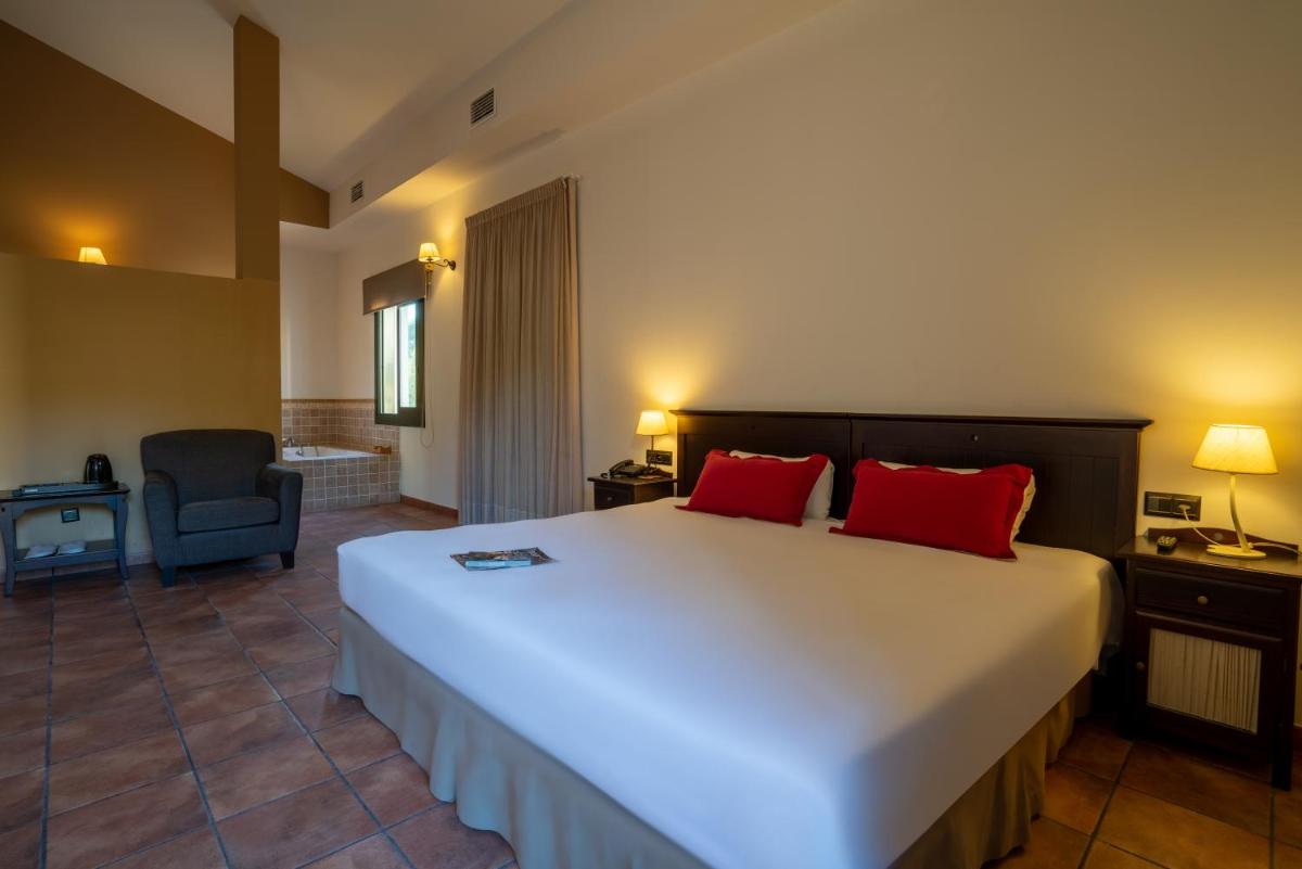 Cama o camas de una habitación en Hotel & Spa Golden Barcelona