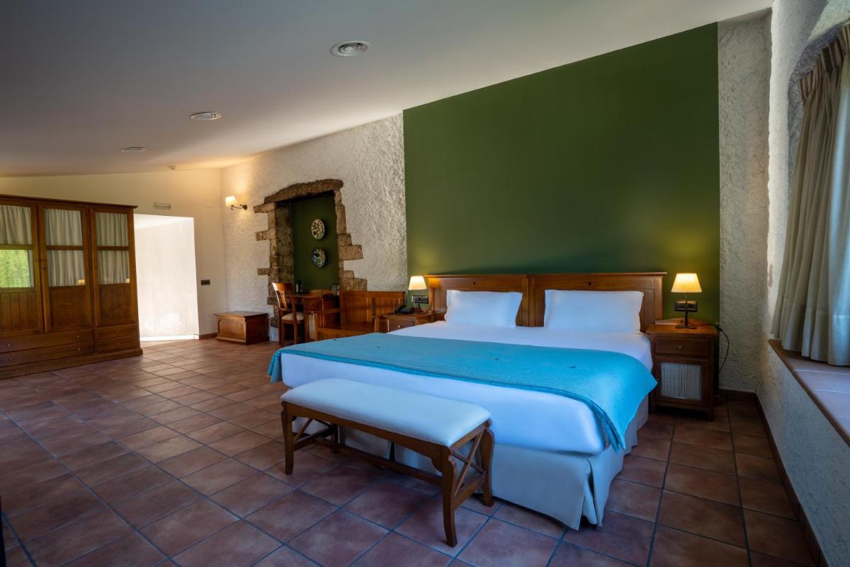 Cama o camas de una habitación en Hotel & Spa Golden Barcelona