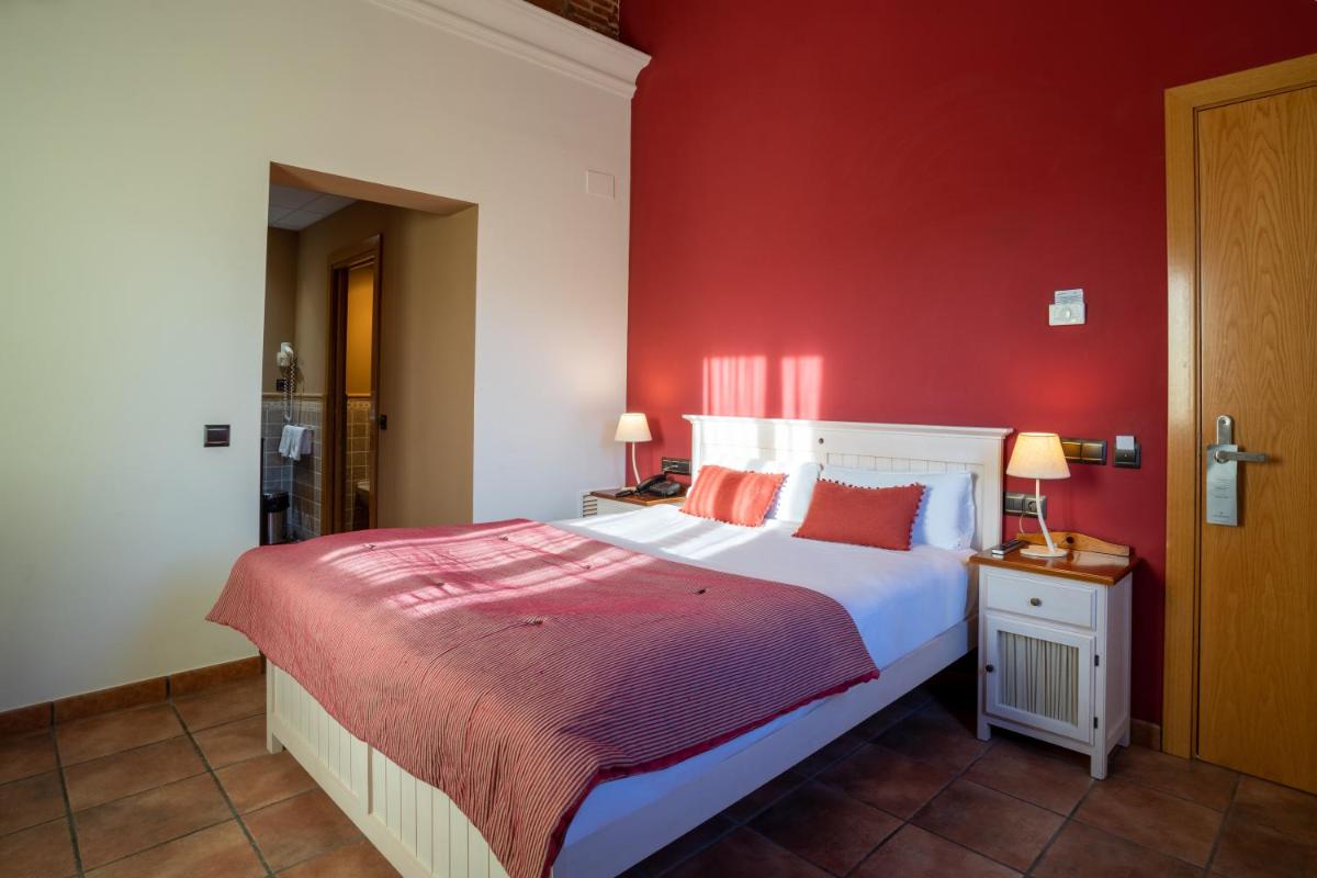 Cama o camas de una habitación en Hotel & Spa Golden Barcelona
