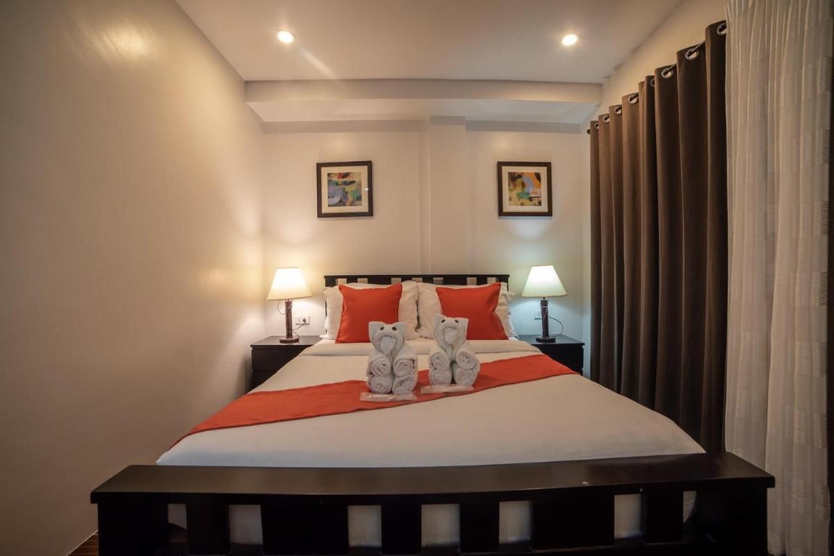 OYO 889 Amboy Hometel - Housity