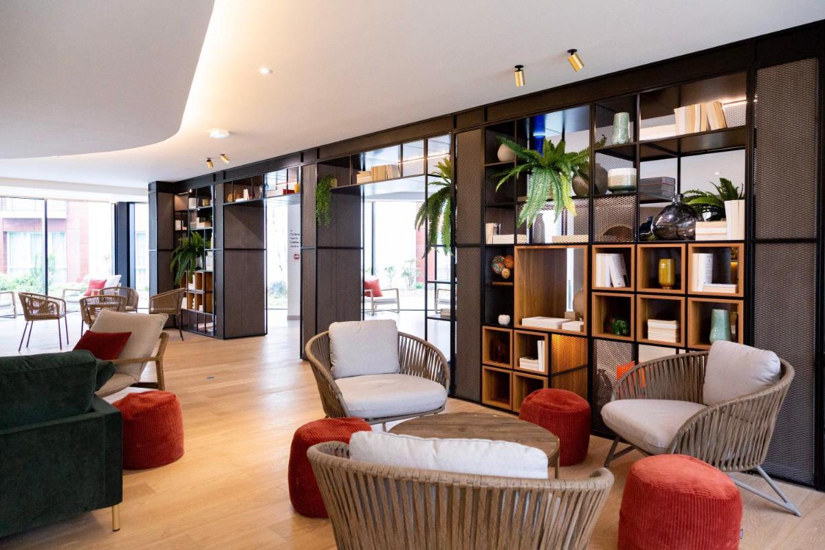 Coin salon dans l'établissement Paxton Paris MLV