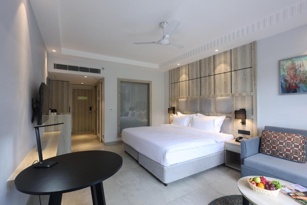 Ramada by Wyndham Goa Arpora - Housity