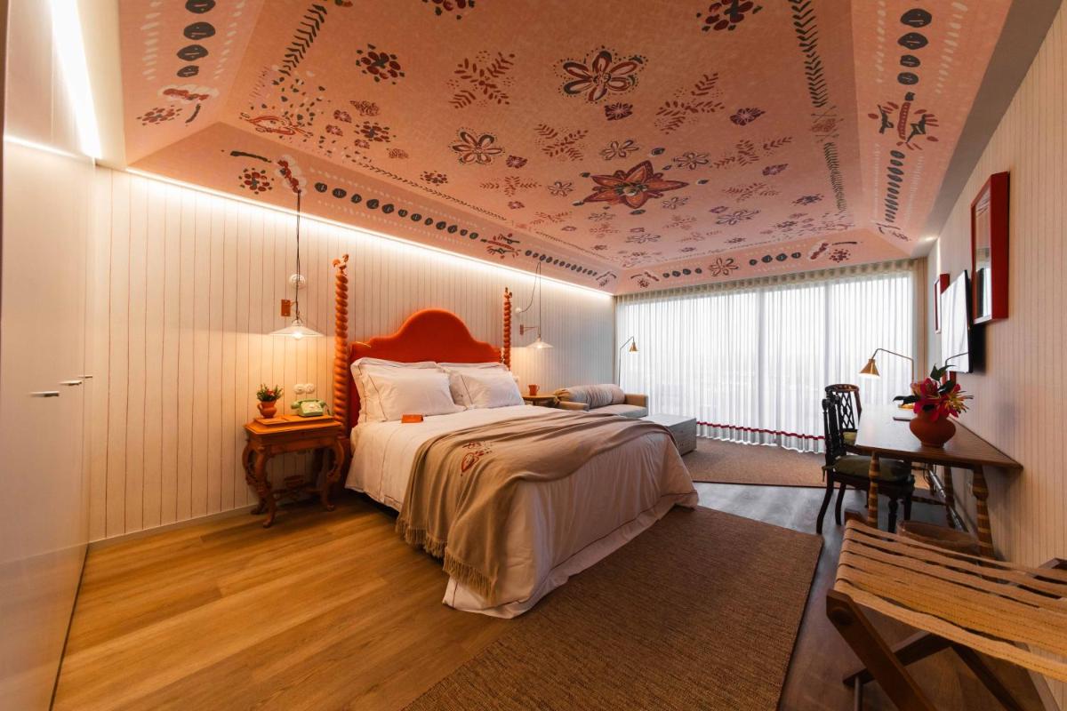 Uma cama ou camas num quarto em Solar de Vila Meã