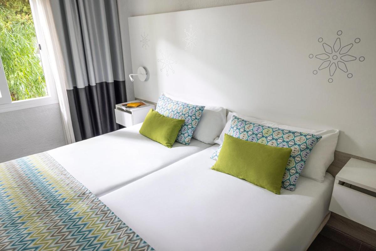 Cama o camas de una habitación en TUI MAGIC LIFE Cala Pada - All Inclusive