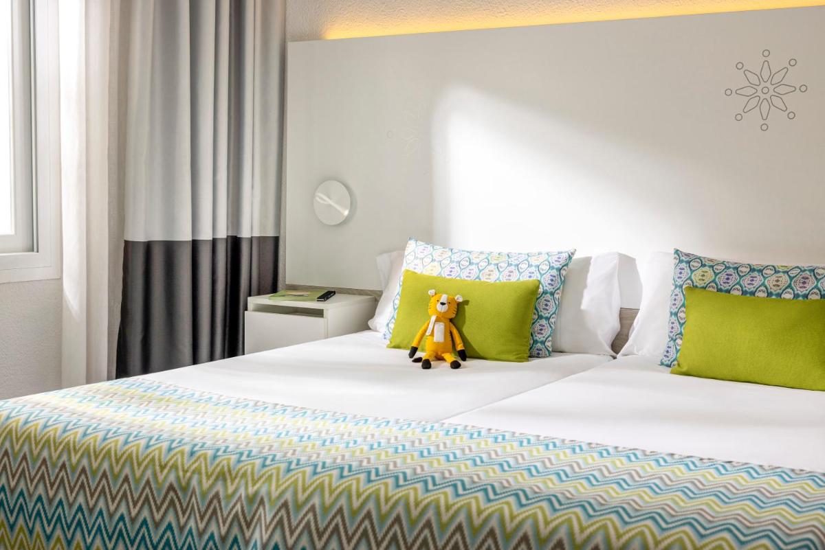 Cama o camas de una habitación en TUI MAGIC LIFE Cala Pada - All Inclusive
