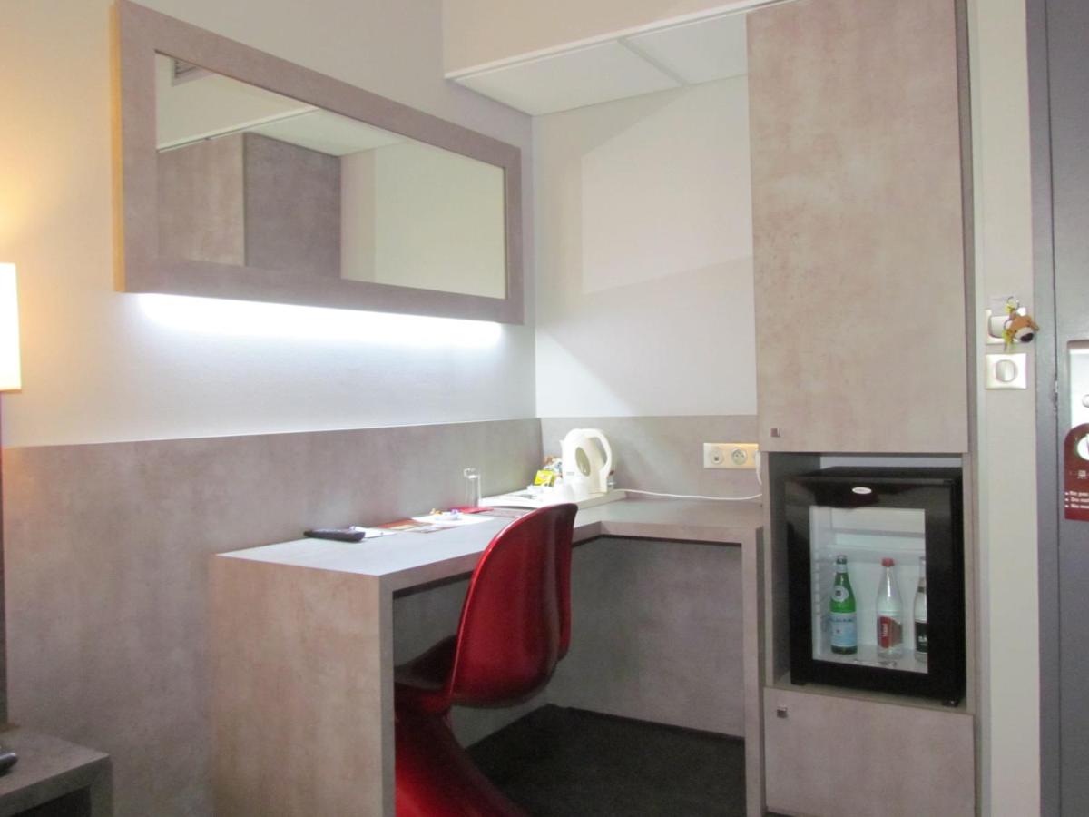 Cuisine ou kitchenette dans l'établissement Hotel L'Hotan