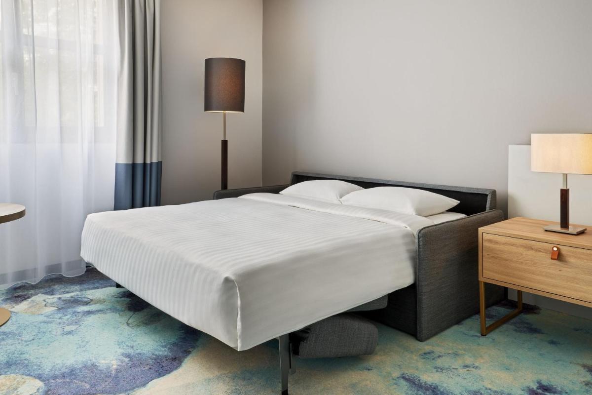 Ein Bett oder Betten in einem Zimmer der Unterkunft Hamburg Marriott Hotel Ein Bett oder Betten in einem Zimmer der Unterkunft Hamburg Marriott Hotel