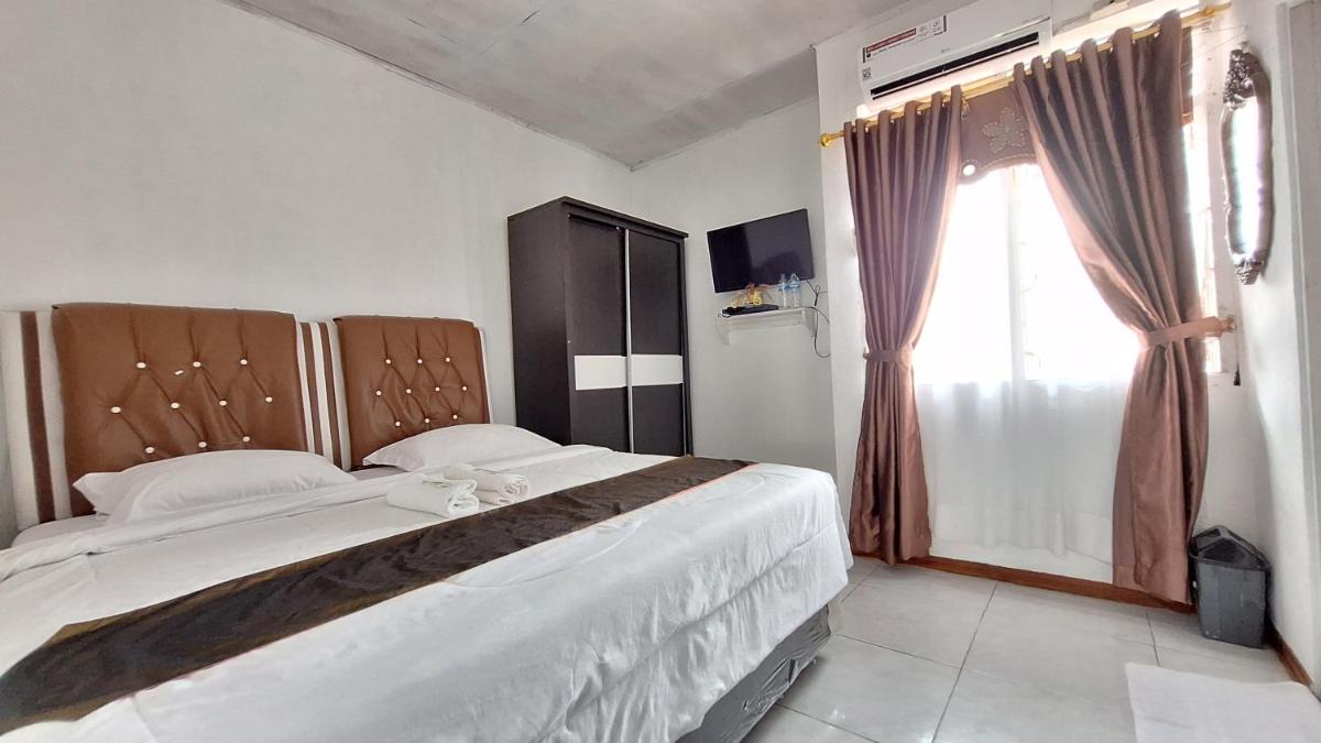 Harisha Homestay Sawah Lunto Syariah Redpartner - Housity