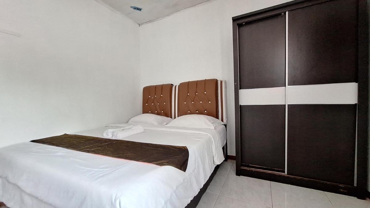 Harisha Homestay Sawah Lunto Syariah Redpartner - Housity