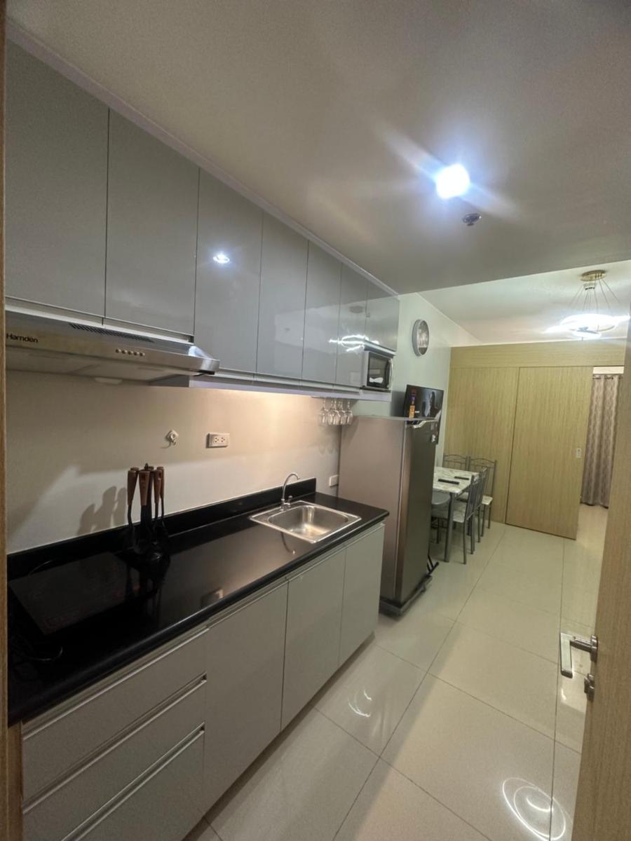 The Grass Residences tower 5 CD Place Staycation - Housity