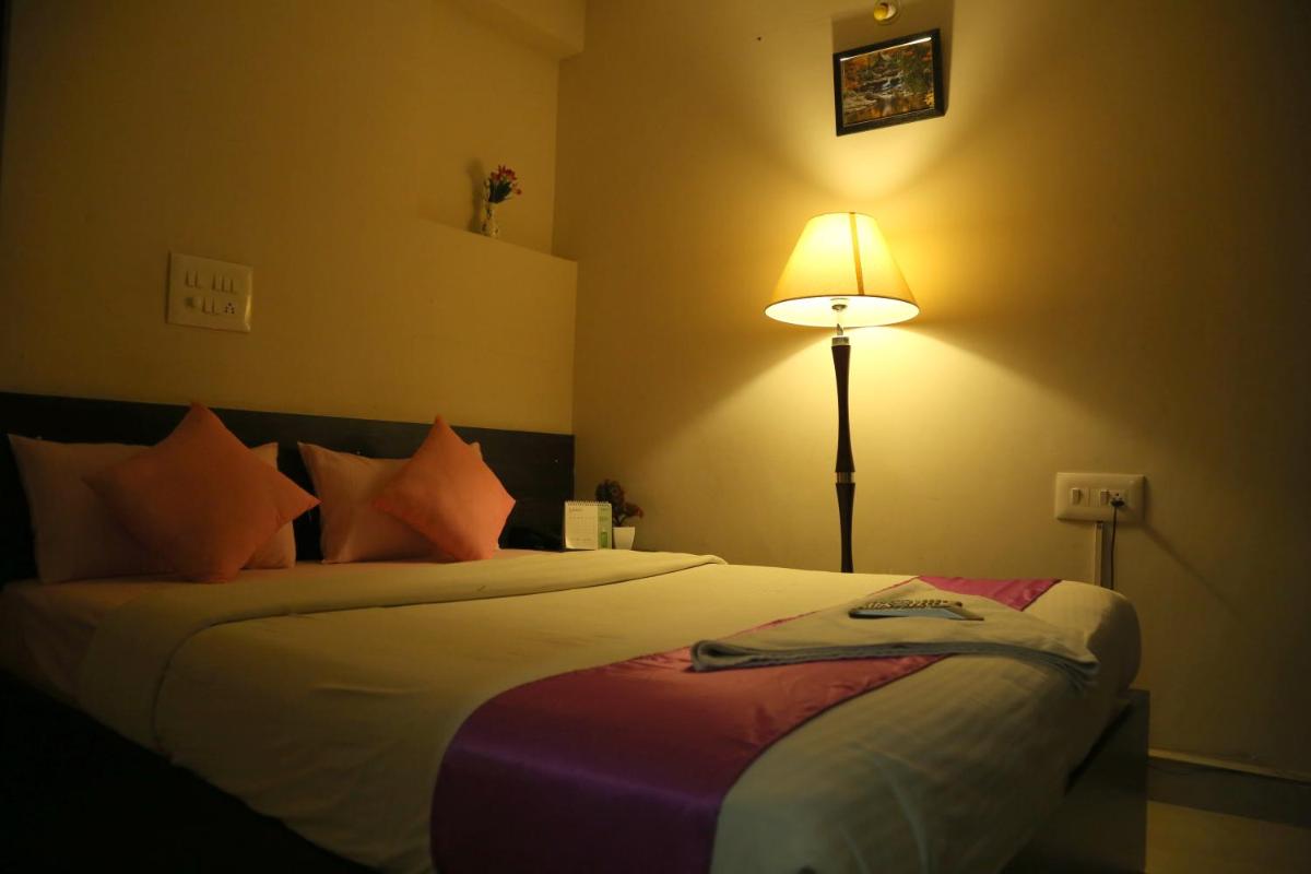 Orange Corner Hotel, Airport pickup & drop Available 24X7 - Housity