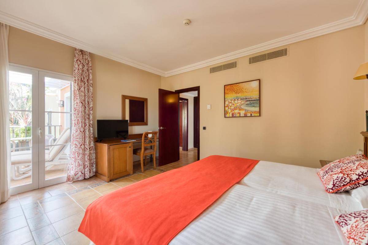 Cama o camas de una habitación en Hotel Cordial Mogán Playa