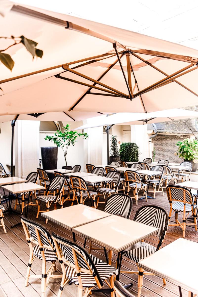 Restaurant ou autre lieu de restauration dans l'établissement Grand Hôtel Champs-Elysées