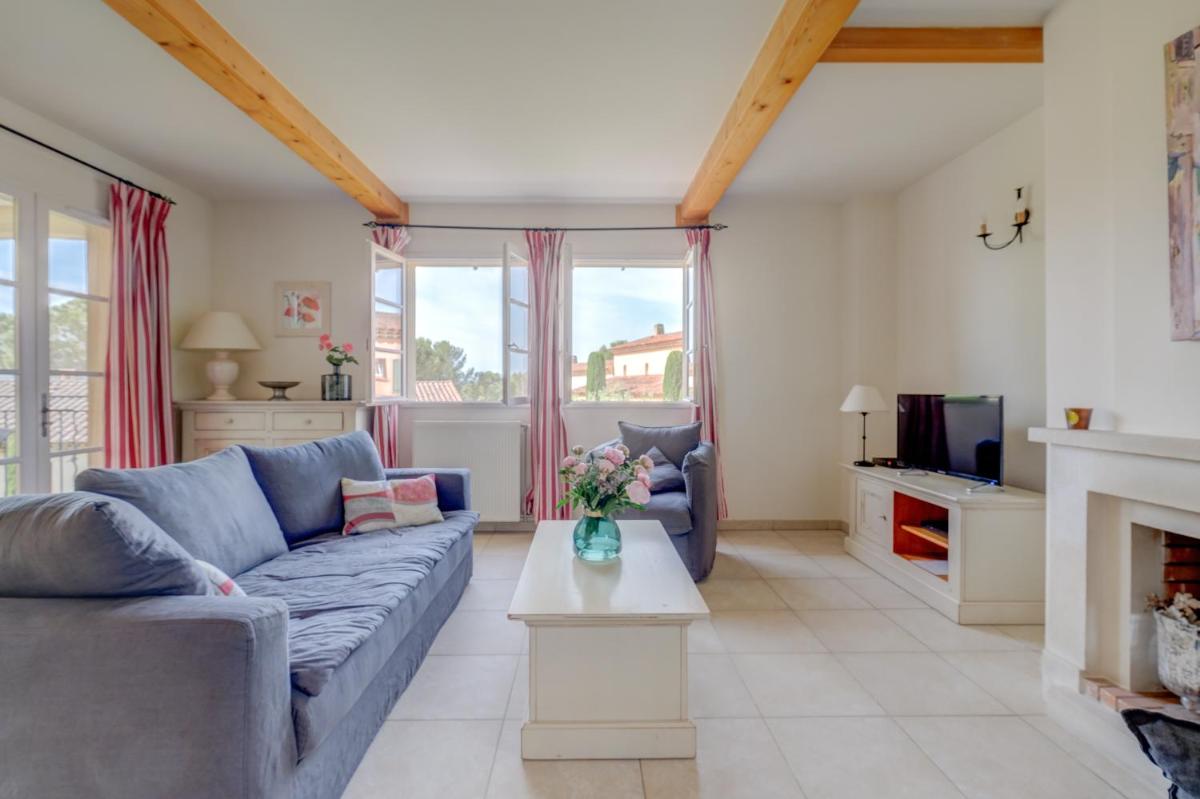 Coin salon dans l'établissement Les Appartements et Maisons du Domaine de Saint Endréol Golf & Spa Resort