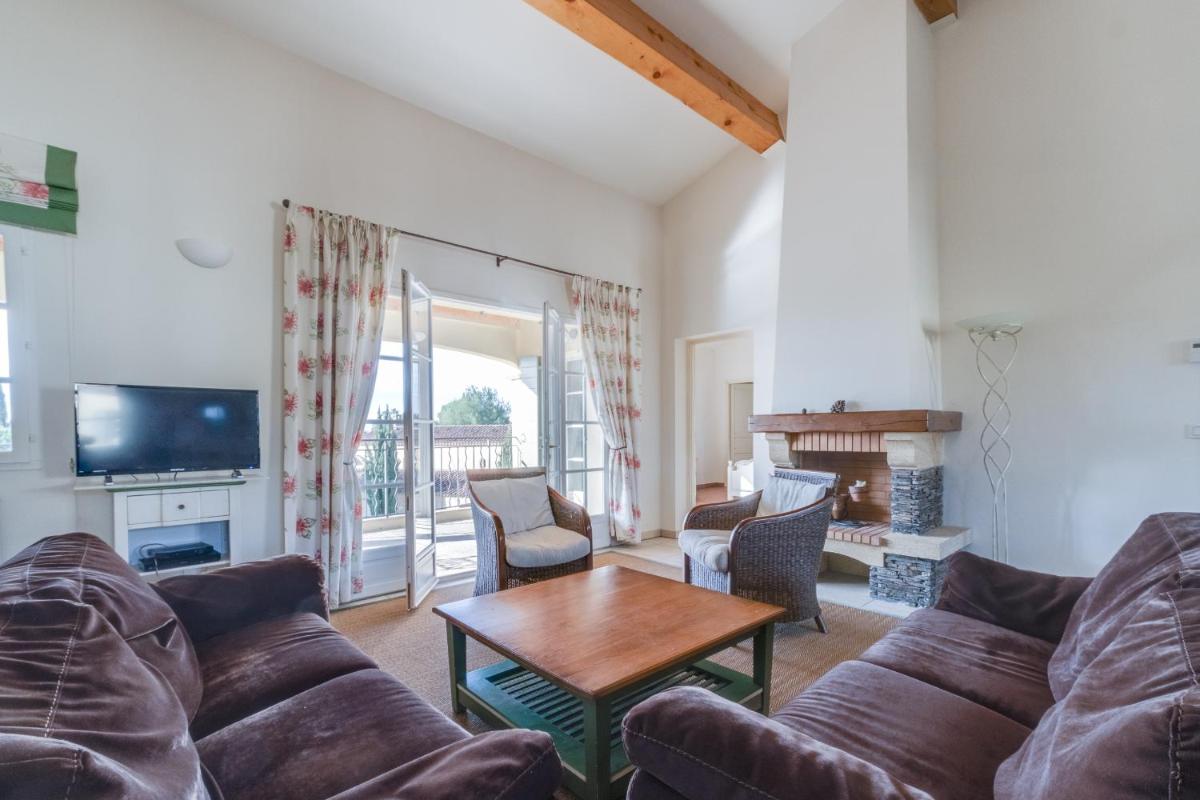 Coin salon dans l'établissement Les Appartements et Maisons du Domaine de Saint Endréol Golf & Spa Resort