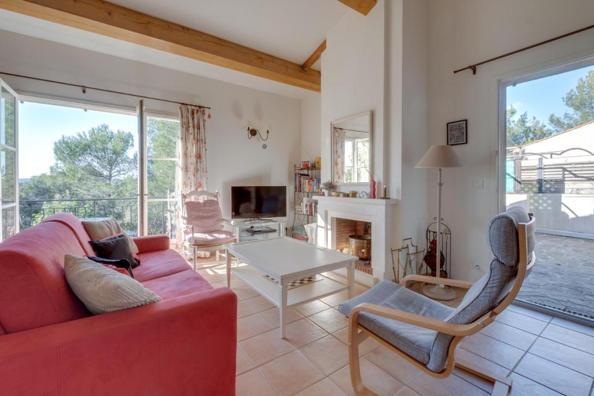Coin salon dans l'établissement Les Appartements et Maisons du Domaine de Saint Endréol Golf & Spa Resort