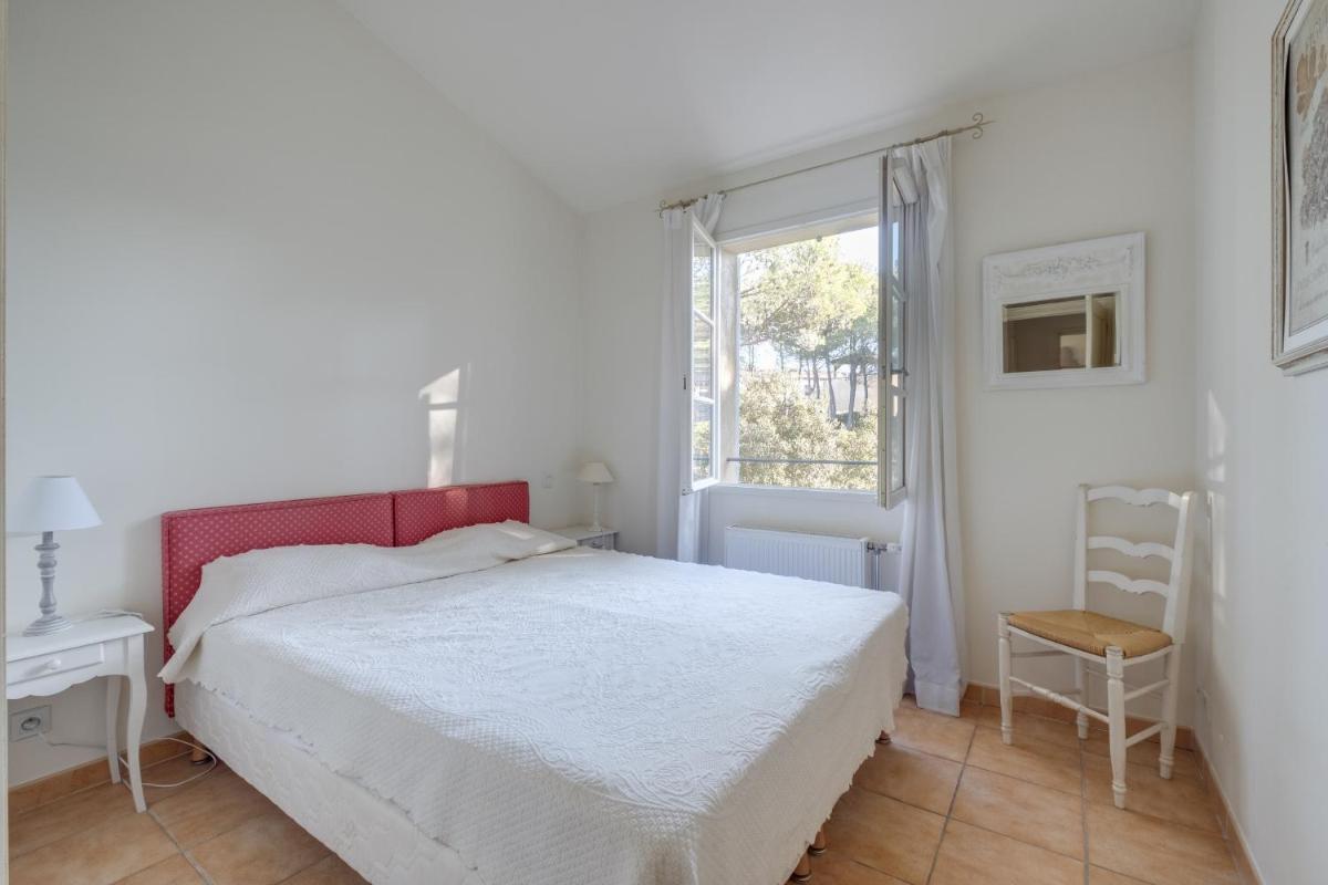 Un ou plusieurs lits dans un hébergement de l'établissement Les Appartements et Maisons du Domaine de Saint Endréol Golf & Spa Resort