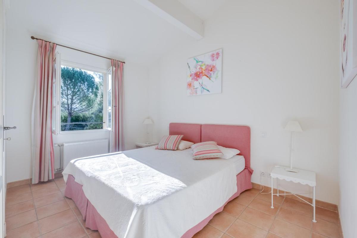 Un ou plusieurs lits dans un hébergement de l'établissement Les Appartements et Maisons du Domaine de Saint Endréol Golf & Spa Resort