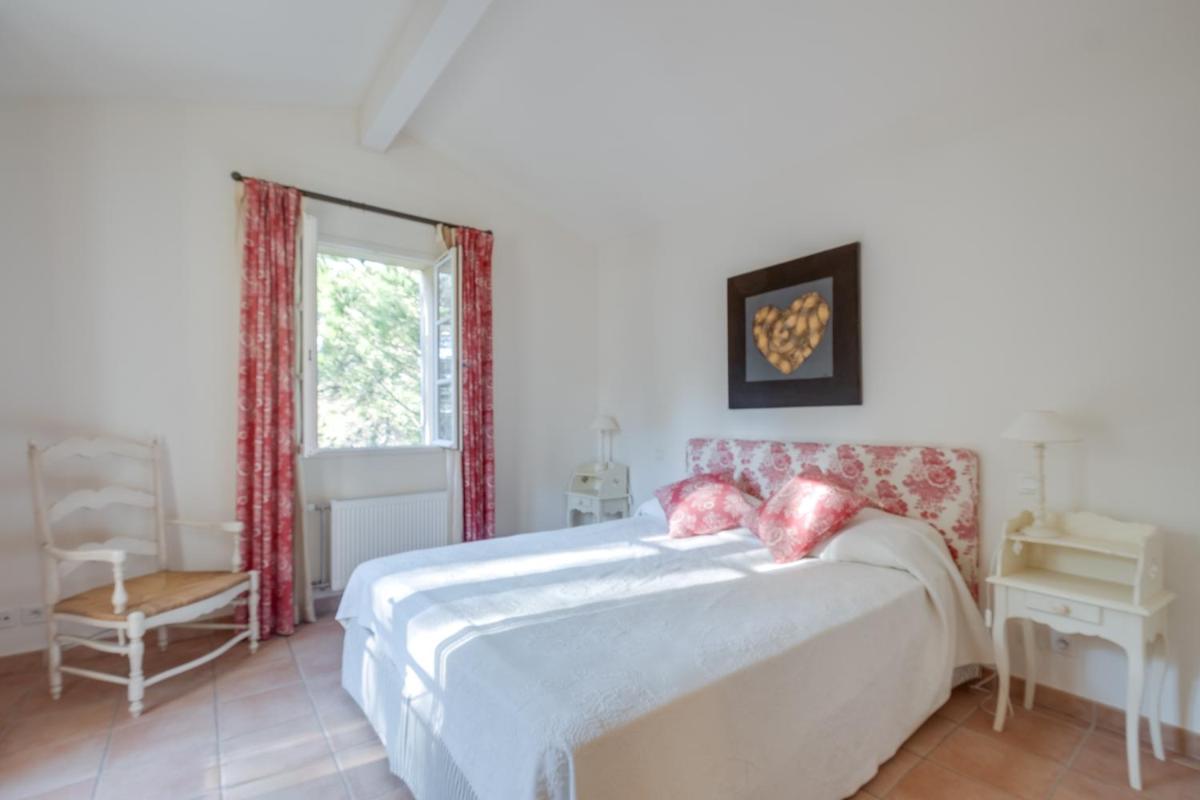 Un ou plusieurs lits dans un hébergement de l'établissement Les Appartements et Maisons du Domaine de Saint Endréol Golf & Spa Resort
