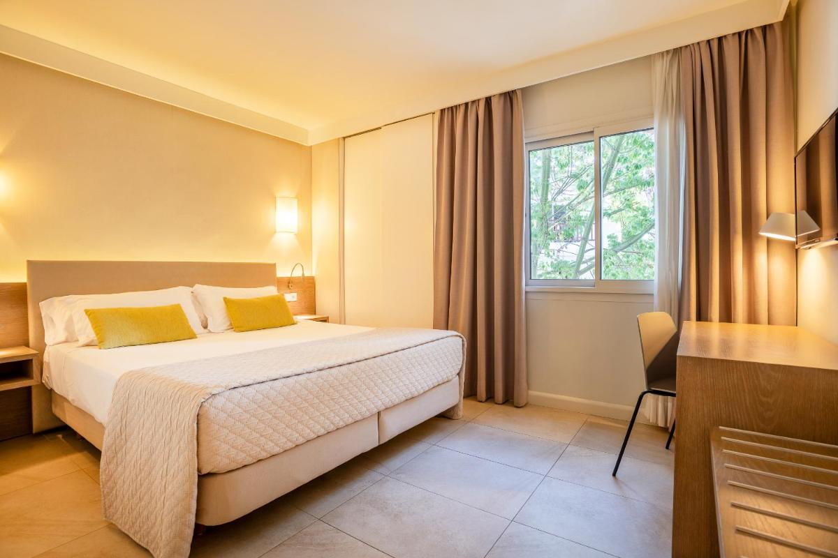 Cama o camas de una habitación en Inturotel Esmeralda Park