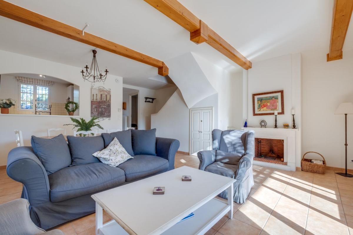 Coin salon dans l'établissement Les Appartements et Maisons du Domaine de Saint Endréol Golf & Spa Resort