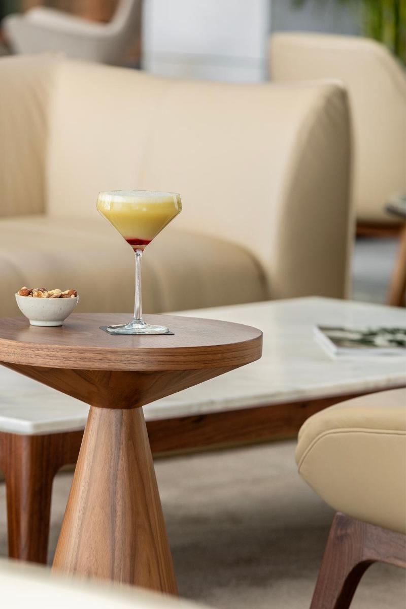 Uma área de estar em EVOLUTION Cascais-Estoril Hotel