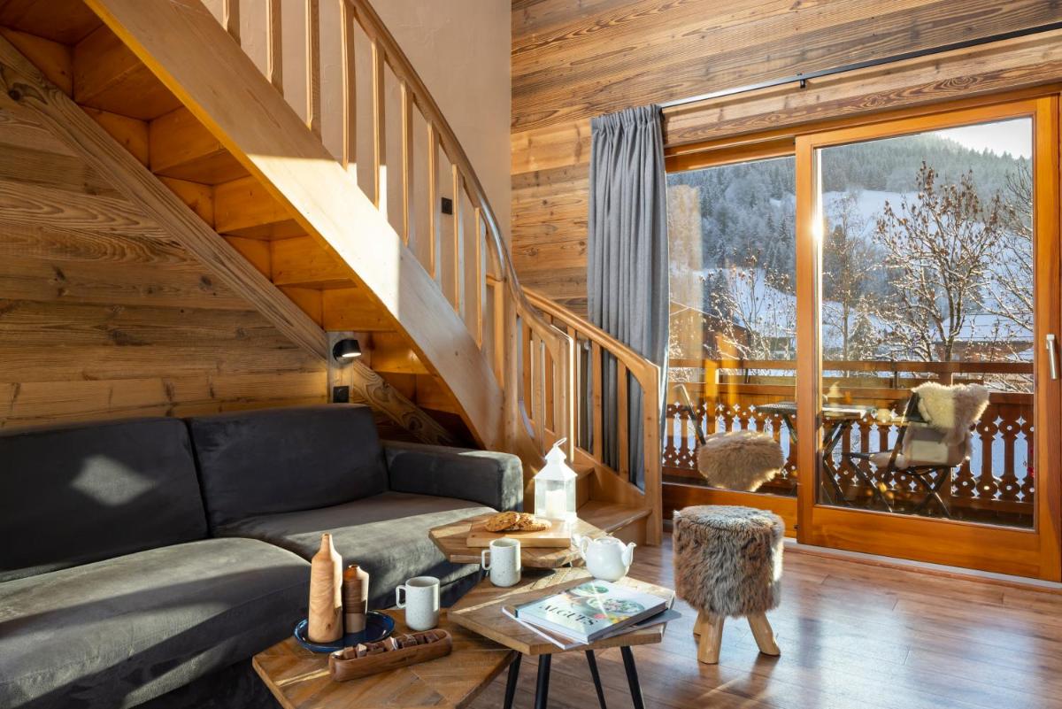 Coin salon dans l'établissement Hôtel et Spa Le Vermont