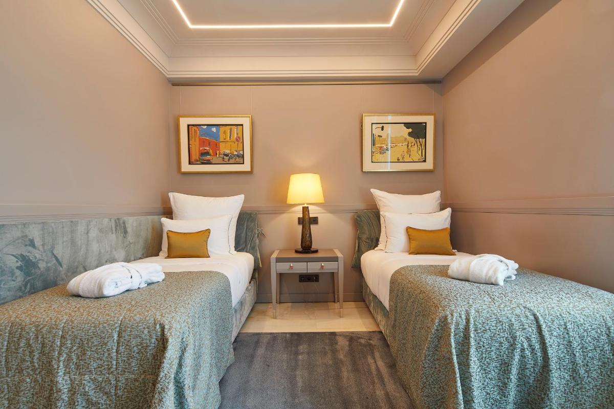 Cama o camas de una habitación en Alàbriga Hotel GL