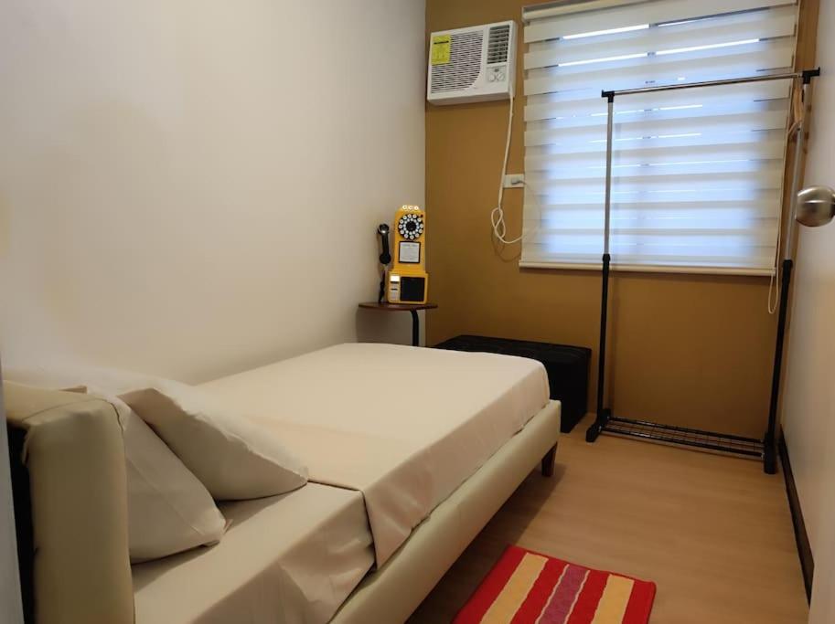 Marilao Staycation near Philippine Arena Bulacan with FREE PARKING by Retro354 Condotel - Housity