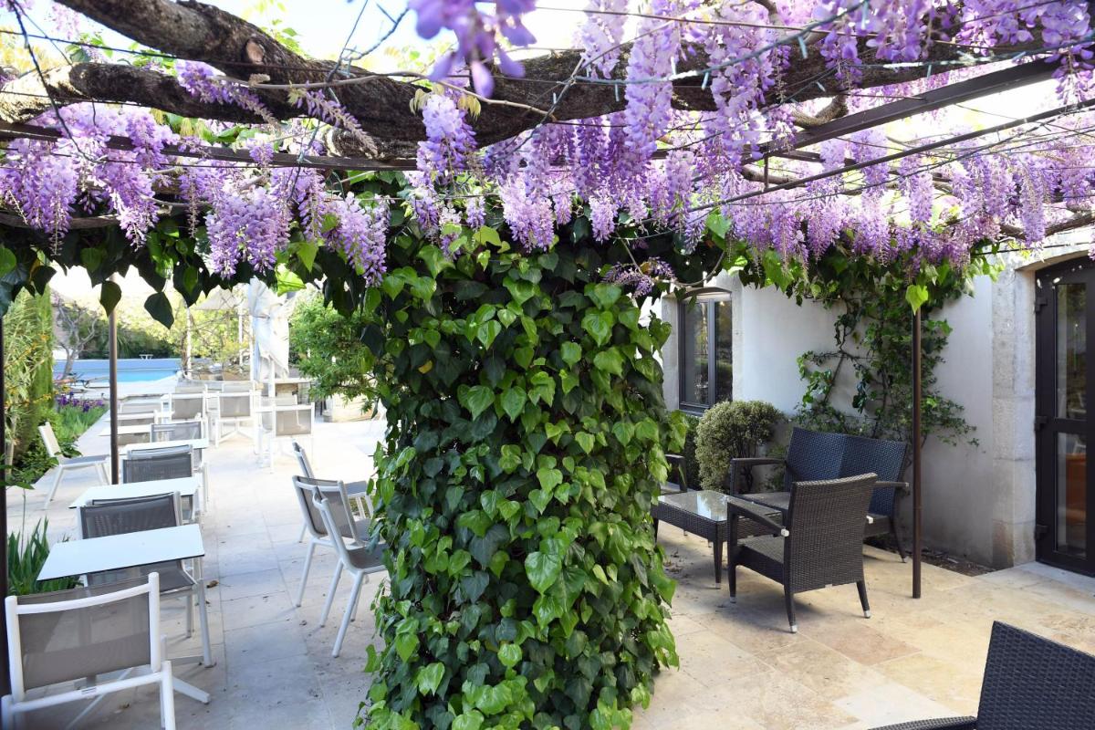 Jardin de l'établissement Hotel du Soleil et Spa