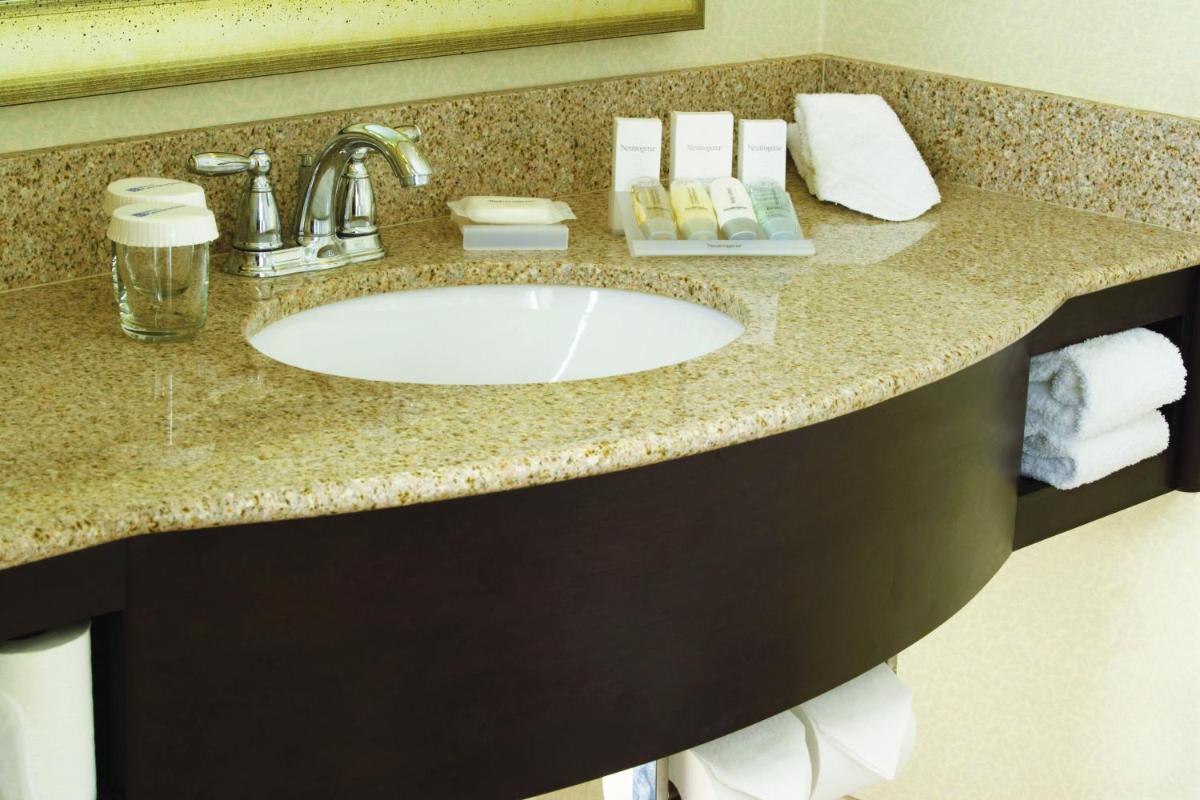a bathroom with a sink in a hotel room at Hilton Garden Inn, Trivandrum in Trivandrum