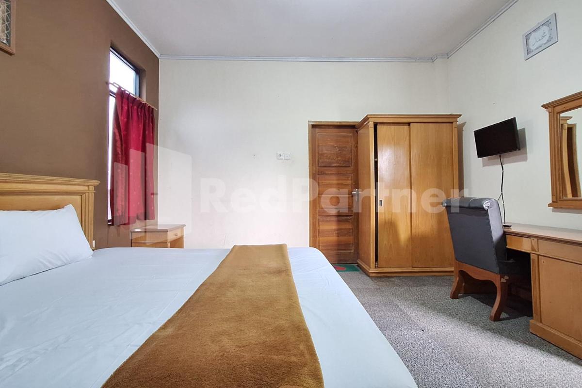 Hotel Graha Muslim RedPartner - Housity