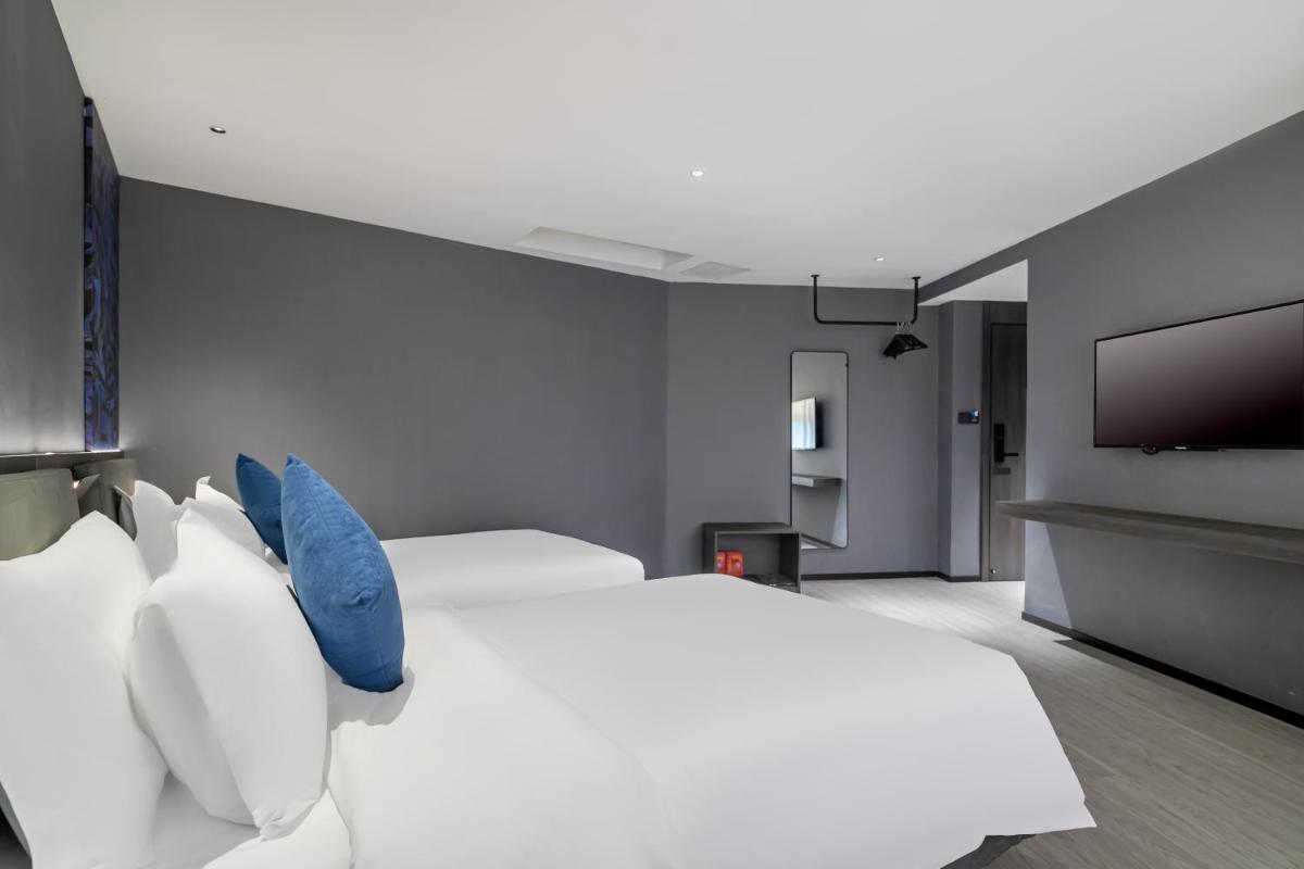 Insail Hotels (Guangyuanxincun Jingtai Pedestrian Street Guangzhou) - Housity