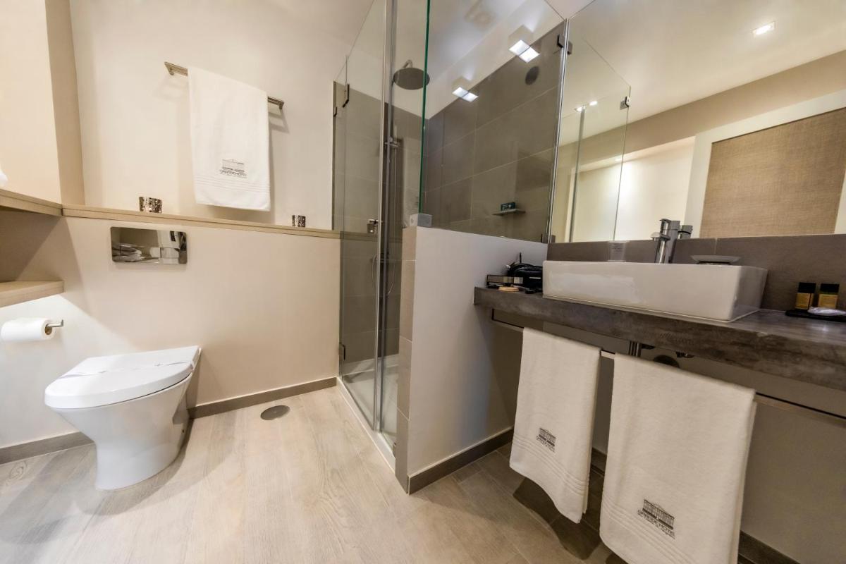 Uma casa de banho em Grande Hotel das Caldas da Felgueira