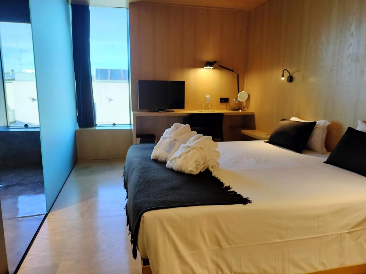 Uma cama ou camas num quarto em Cró Hotel Rural