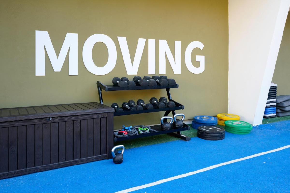 Gimnasio o instalaciones de fitness de AluaSoul Mallorca Resort - Adults only