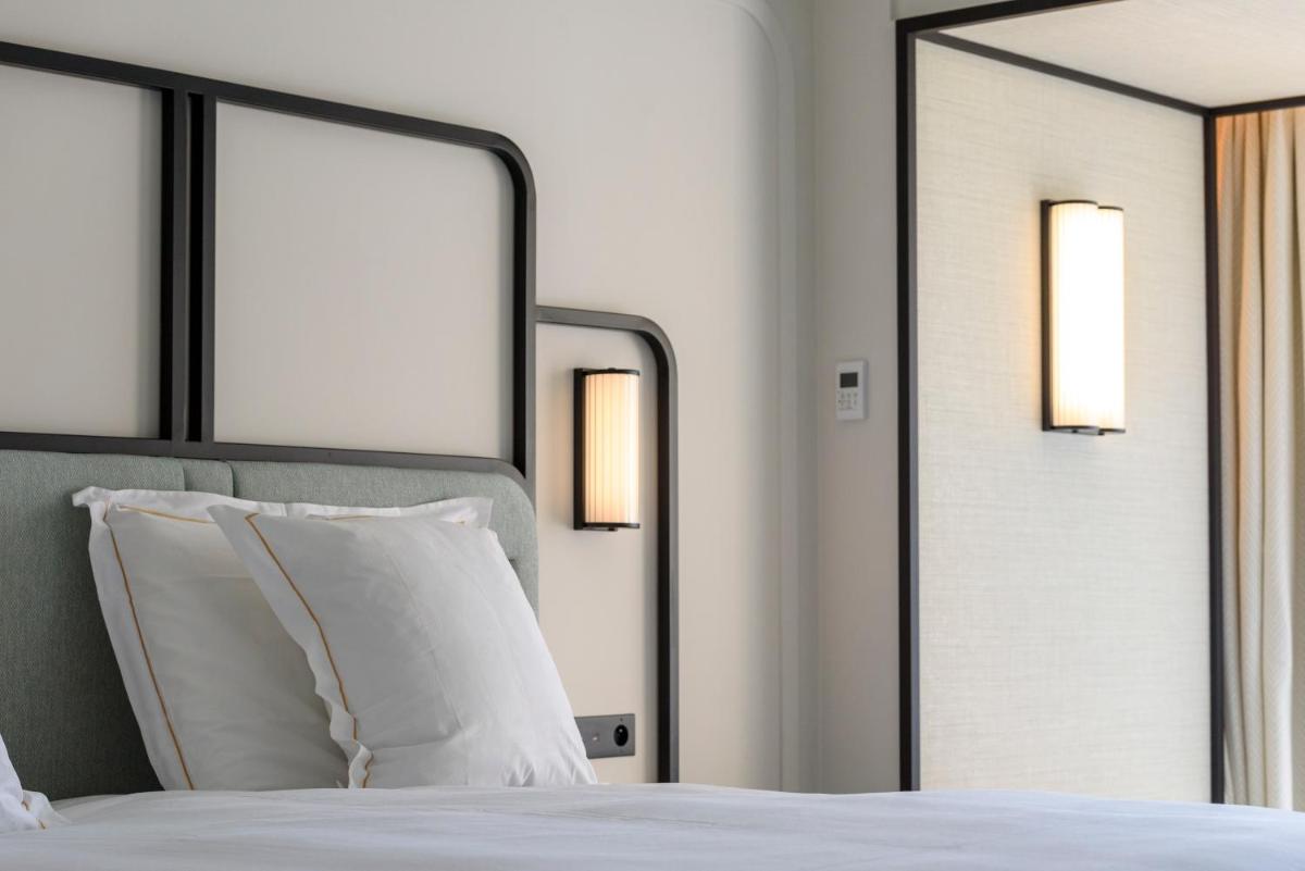 Un ou plusieurs lits dans un hébergement de l'établissement Mondrian Cannes