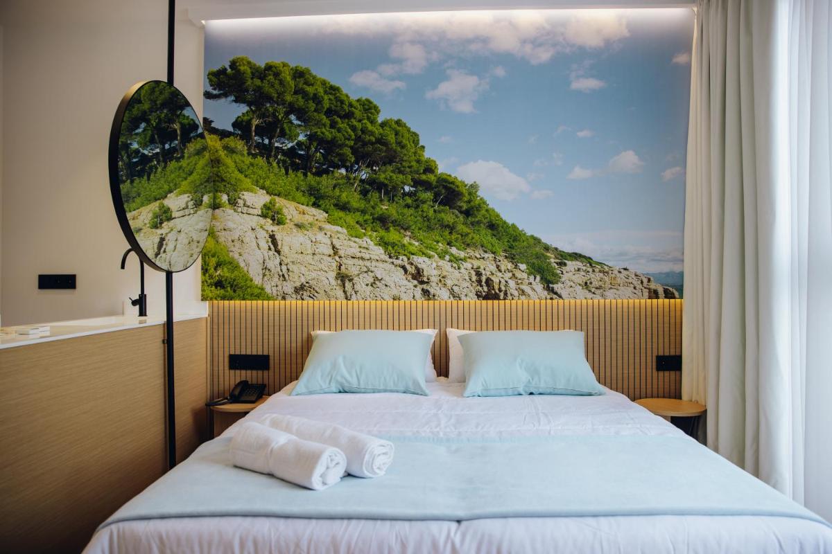 Cama o camas de una habitación en Alannia Salou