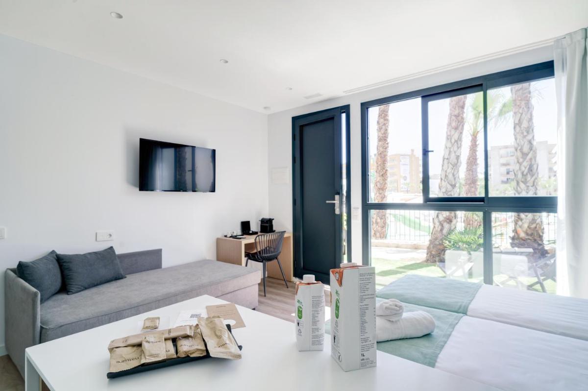 Cama o camas de una habitación en Alannia Salou