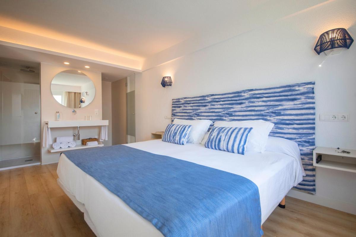 Cama o camas de una habitación en Blau Punta Reina